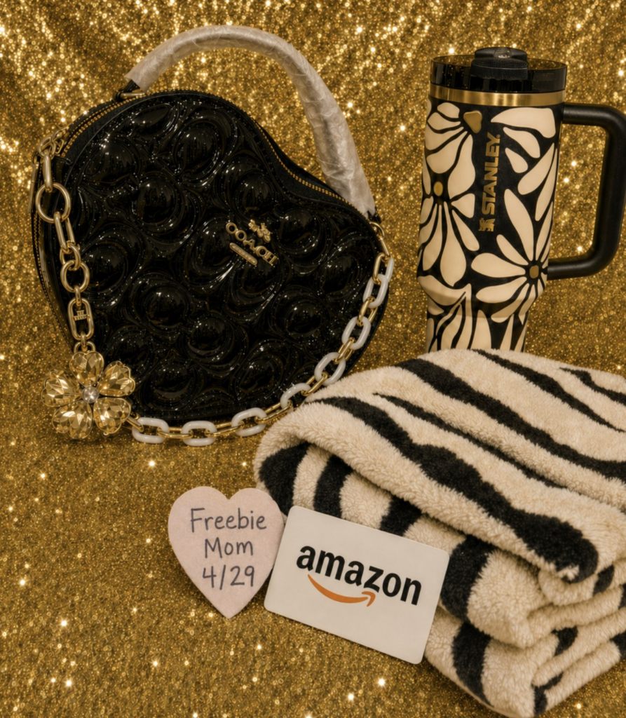 Glam giveaway prize bundle with Coach bag, Stanley cup, Amazon gift card, and blanket